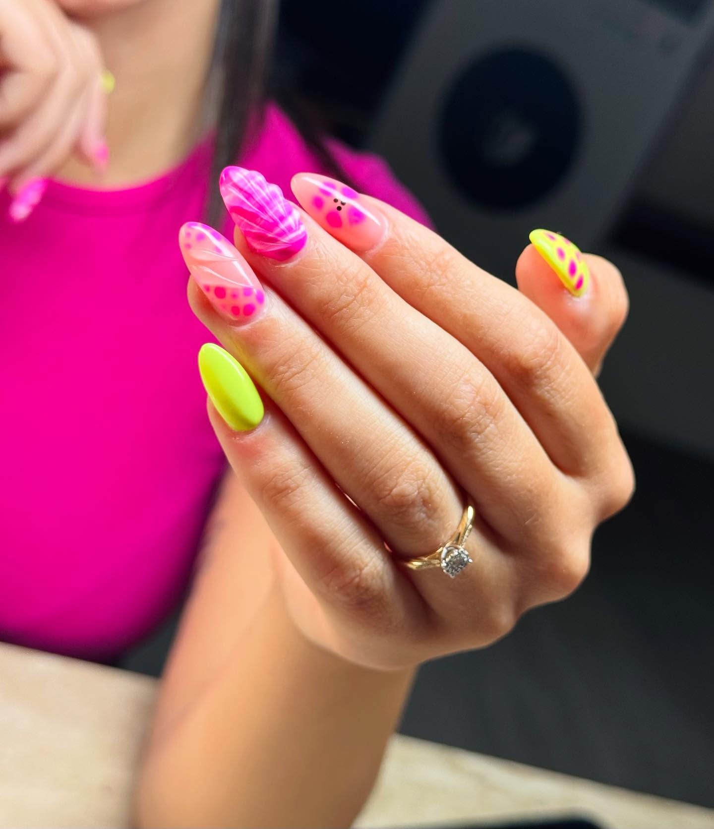 Neon pink and lime marble nail design